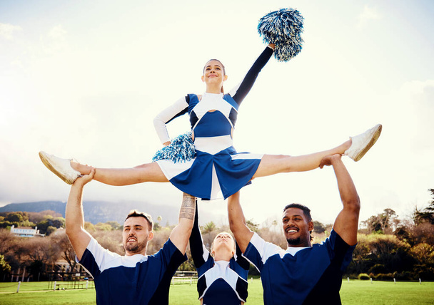 Sports woman, sky and cheerleader performance with smile and energy to celebrate outdoor. Cheerleading person dance with team support, motivation and hands for training, workout or competition. - Fotoğraf, Görsel