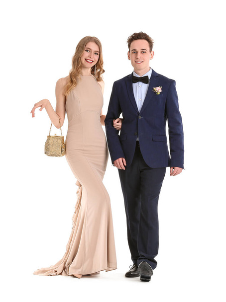 Beautiful couple dressed for prom on white background - Zdjęcie, obraz