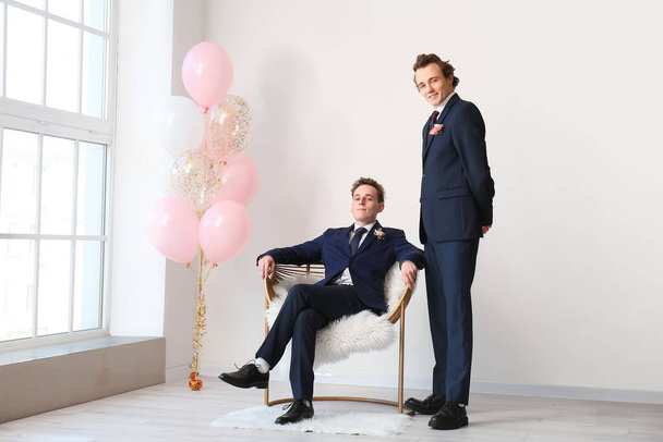 Teenage boys dressed for prom in room - Valokuva, kuva