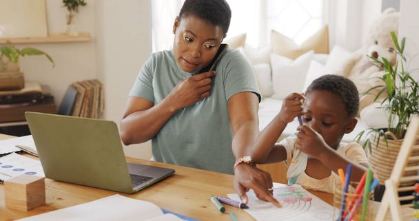 Black woman, laptop and help child with homework, while typing work and proposal for business. Mama, child and assist kid with color book, typing on digital device and bonding being loving and talk - Foto, Imagem