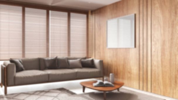 Fond flou, salon japandi avec murs en bois et maquette du cadre. Canapé en tissu avec oreillers, tapis et décors. Design intérieur minimal - Photo, image