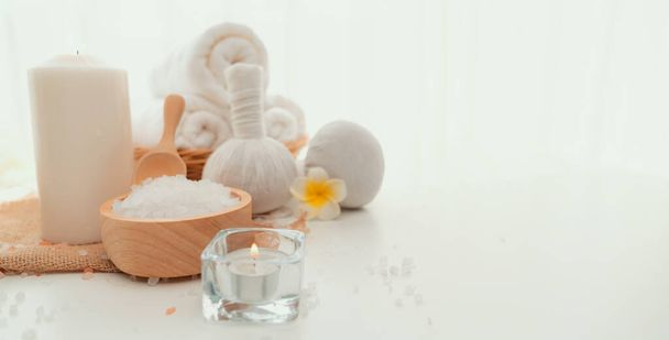 Spa accessory composition set in day spa hotel , beauty wellness center . Spa product are placed in luxury spa resort room , ready for massage therapy from professional service . - Zdjęcie, obraz