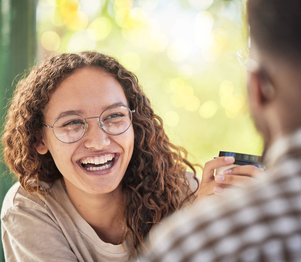 Face, happy or date and a black woman drinking coffee in the park with her boyfriend during summer. Smile, love and dating with a young female smiling at her partner for romance or affection. - Photo, Image
