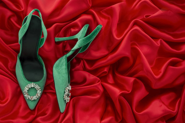 high heel shoes  on a bright  silk background - Foto, Imagem