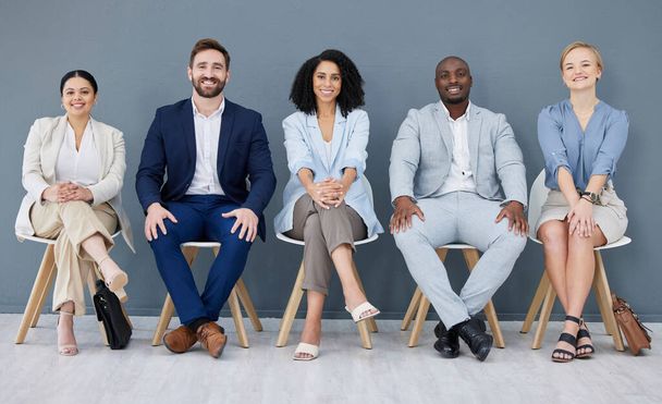 Business, portrait and people in row waiting for interview, meeting or opportunity together. Smile, diversity group sitting in line for hiring, recruitment or recruiting candidates of human resources. - Fotó, kép