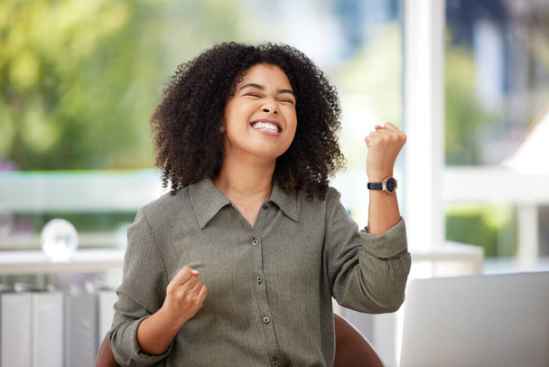 Laptop, success and black woman celebrating in office, happy and excited against blurred background. Good news, email and girl corporate employee celebrating proposal, achievement or goal victory. - Фото, изображение