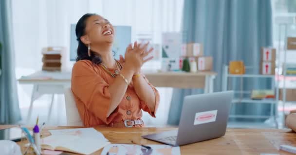 Excited asian woman, laptop and celebration for winning, sale or good news in small business, logistics or ecommerce. Happy female celebrating win, victory or achievement on computer in marketing. - Filmati, video