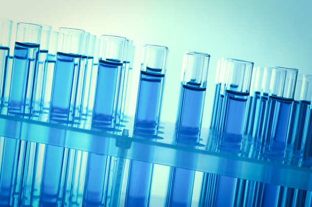 Test-tubes with blue fluid, close-up - Photo, Image