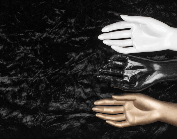 artificial hands on black velvet - Fotoğraf, Görsel