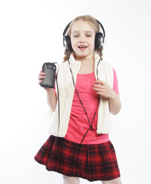 picture of happy girl in big headphones - Foto, Imagen