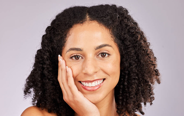Black woman, portrait and spa beauty from skin glow and dermatology in a studio. Makeup, happiness and cosmetics of a young model with afro feeling happy from salon, facial and wellness treatment. - Photo, image
