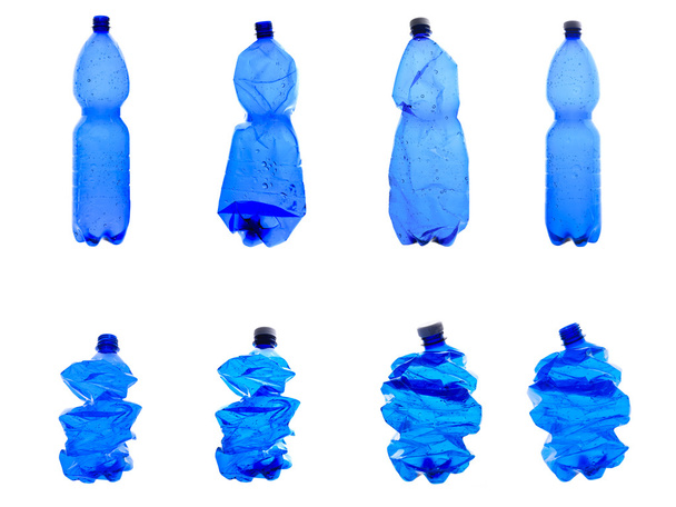 Several blue plastic bottles isolated - Foto, afbeelding