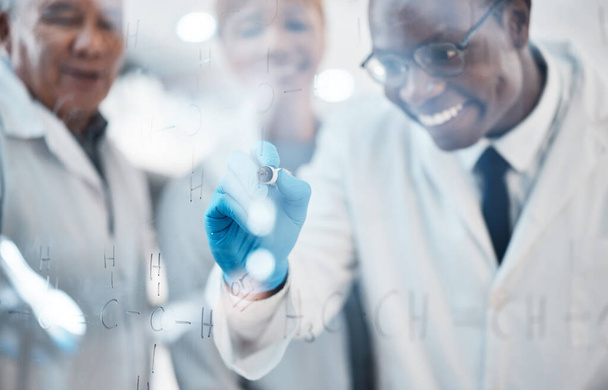 Science, writing on glass and team in laboratory for experiment, chemistry equation and medical test. Healthcare, biotechnology and scientists meeting, brainstorming and thinking of medicine formula. - Foto, imagen