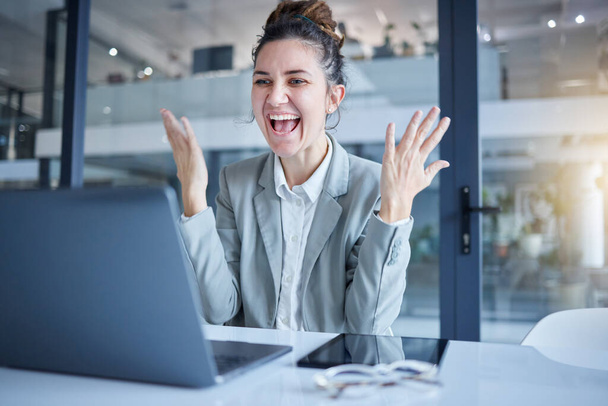 Happy, success and laptop businesswoman celebrating in an office and working and excited for achievement. Celebration, celebrate and corporate employee winning at her goal or promotion. - Фото, изображение