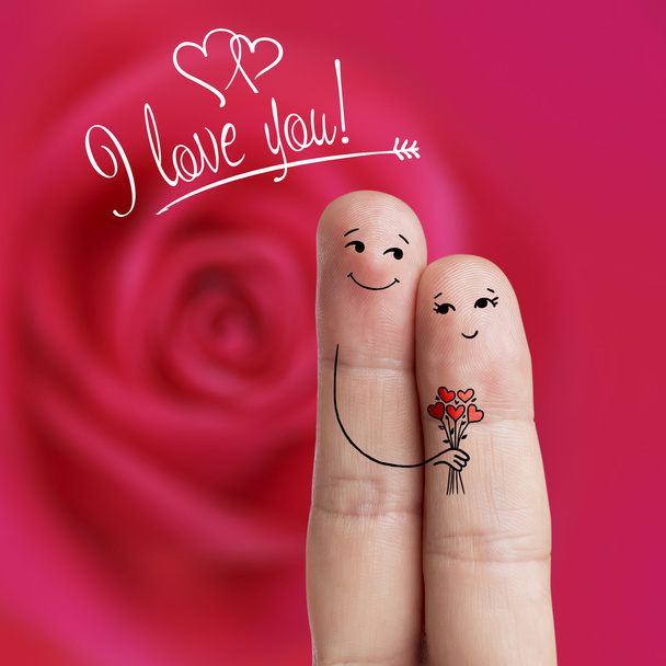 Finger art of a Happy couple. Man is giving bouquet. Stock Image - Photo, Image