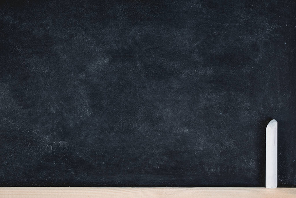Chalk rubbed out on blackboard for background. picture for add text or education background. - Фото, изображение