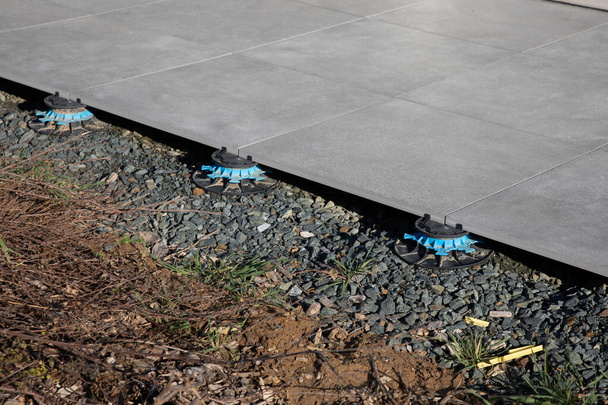 Rubber floor tiles outdoor flooring patio pavers with adjustable plots - Fotoğraf, Görsel