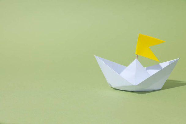 Concept of travel and adventure with paper boat - 写真・画像