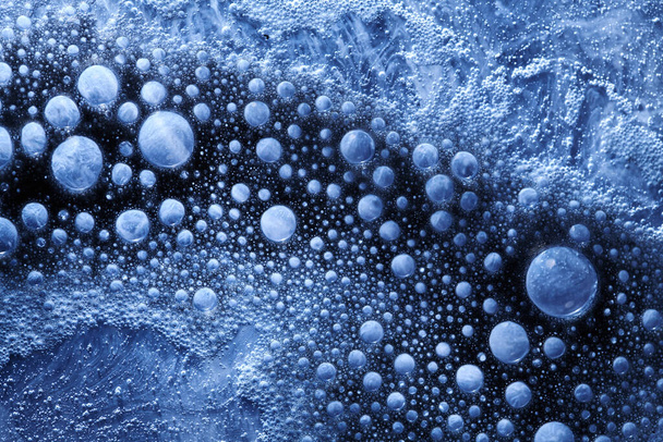 Blue bubbles abstract background. Fluid art, paints underwater - Foto, afbeelding