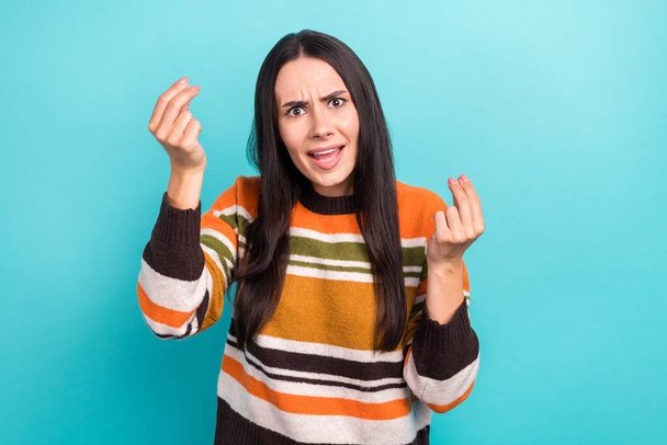 Photo of impressed angry woman wear striped sweater rising arms asking understand her isolated turquoise color background. - Fotoğraf, Görsel