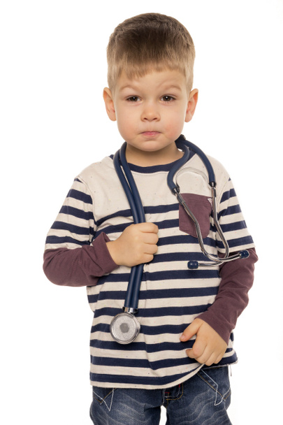 маленький хлопчик зі стетоскопом в руці
 - Фото, зображення