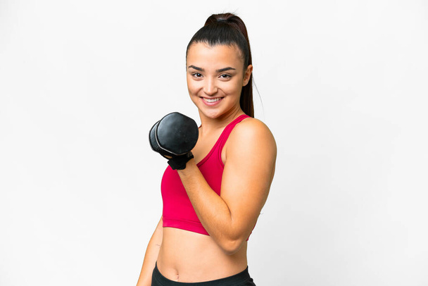 Young sport woman making weightlifting smiling a lot - Foto, Imagem