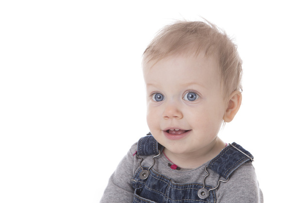 Baby girl in overalls - Φωτογραφία, εικόνα