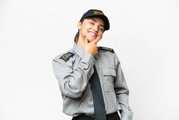 Young safeguard woman over isolated white background smiling - Φωτογραφία, εικόνα