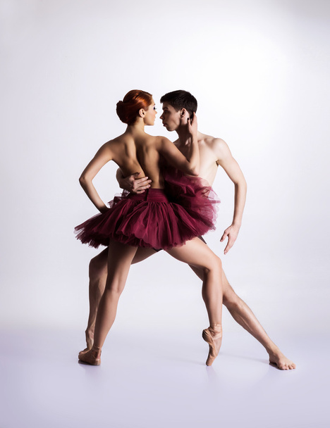 Young and athletic ballet dancers - Фото, изображение