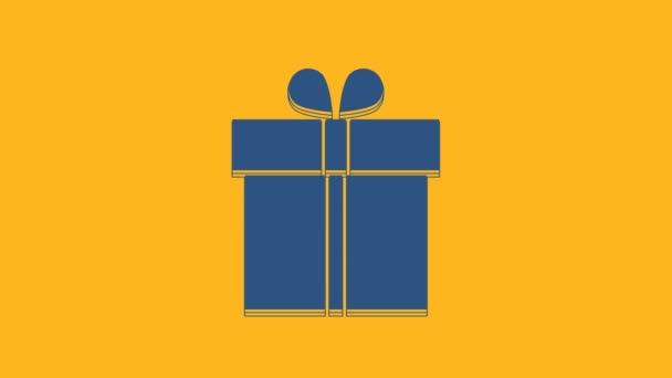 Blue Gift box icon isolated on orange background. 4K Video motion graphic animation. - Video, Çekim