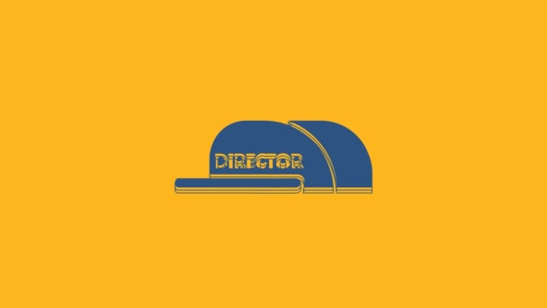 Niebieska czapka z ikoną reżysera napisu odizolowana na pomarańczowym tle. 4K Animacja graficzna ruchu wideo. - Materiał filmowy, wideo