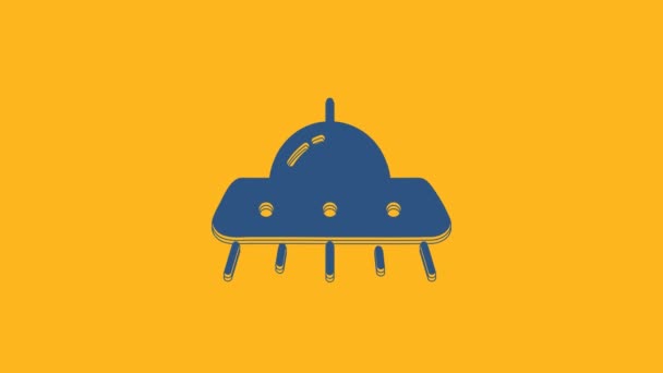 Niebieski UFO latający statek kosmiczny ikona izolowane na pomarańczowym tle. Latający spodek. Kosmiczny statek kosmiczny. Futurystyczny, nieznany obiekt latający. 4K Animacja graficzna ruchu wideo. - Materiał filmowy, wideo