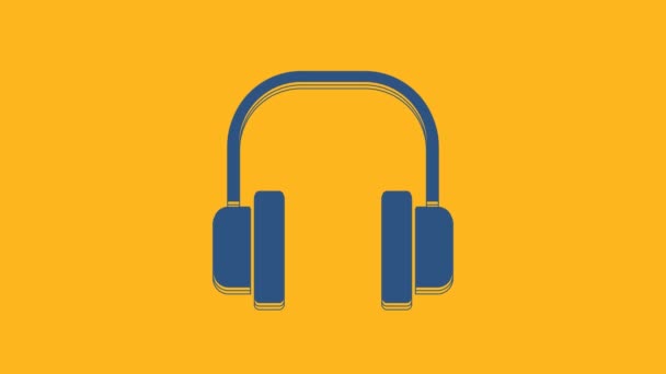 Blue Headphones icon isolated on orange background. Earphones. Concept for listening to music, service, communication and operator. 4K Video motion graphic animation. - Video, Çekim