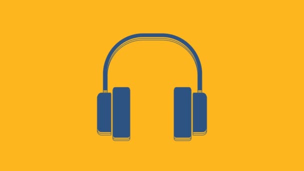 Icono de auriculares azules aislado sobre fondo naranja. Auriculares. Concepto para escuchar música, servicio, comunicación y operador. Animación gráfica de vídeo 4K. - Metraje, vídeo