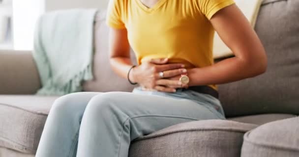 Pain, period and hands of woman on stomach holding belly for cramps, ache and menstruation problem. Health, endometriosis and hurt girl with hand on abdomen for pms, menstrual ache and digestion. - Кадры, видео