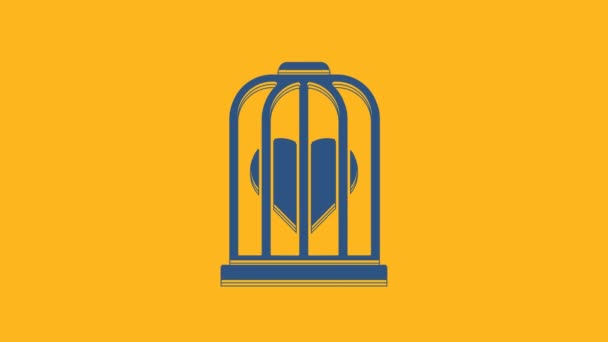 Corazón azul en la jaula del pájaro icono aislado sobre fondo naranja. Señal de amor. El símbolo de San Valentín. Animación gráfica de vídeo 4K. - Metraje, vídeo