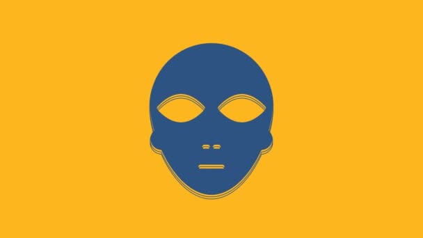 オレンジ色の背景に青いエイリアンのアイコンが隔離されている。外国人の顔や頭のシンボル。4Kビデオモーショングラフィックアニメーション. - 映像、動画