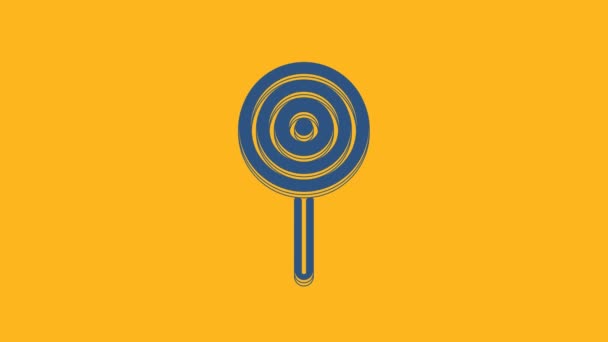 Blue Lollipop icon isolated on orange background. Candy sign. Food, delicious symbol. 4K Video motion graphic animation. - Felvétel, videó