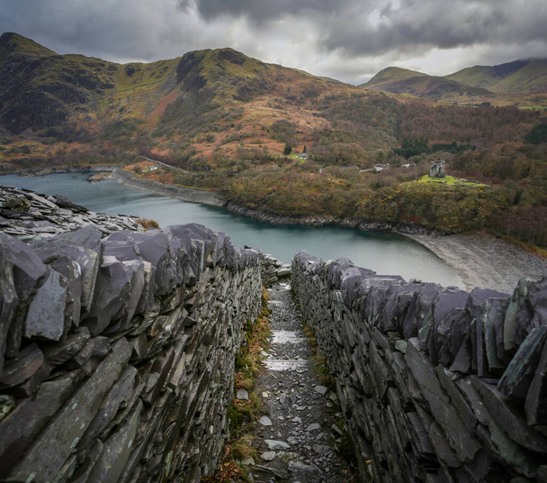 Llyn Peris and Dolbadarn Castle viewed from the slate quarries of Llanberis in North Wales U - Photo, Image