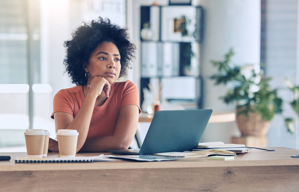Thinking, laptop or black woman planning marketing, advertising or company KPI growth in office. Employee, tech or business woman for small business, startup or remote work for creative strategy. - Foto, imagen