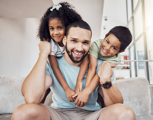 Children happy, home relax and father getting hug from kids on the living room sofa of their house. Portrait of kids and dad hugging for love and happiness on the family couch in an apartment lounge. - 写真・画像