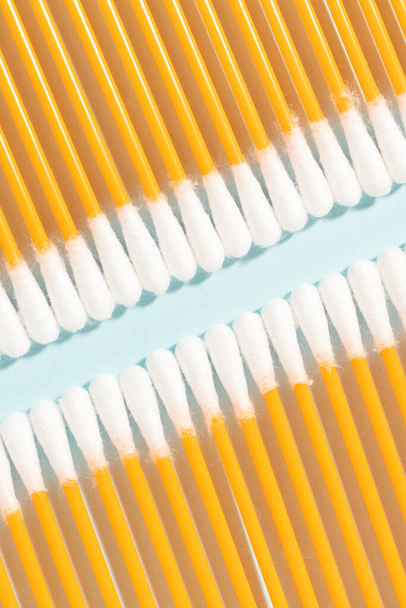 Yellow cotton swabs close-up. Top view. - 写真・画像