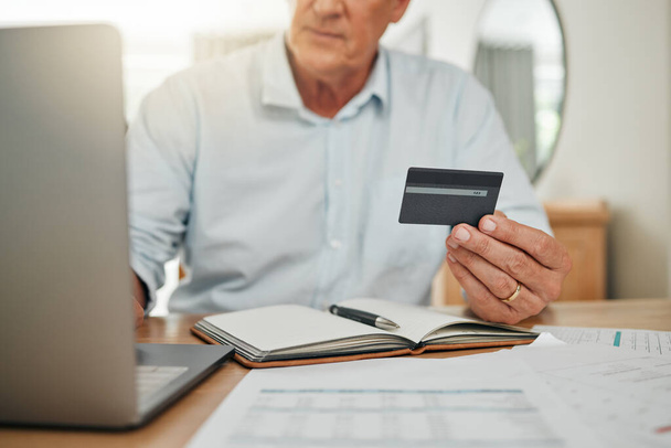 Credit card, online shopping senior man or banking with laptop, internet or web for audit, bills or tax payment at home. Elderly with ecommerce for shopping, trading or retirement investment planning. - Fotoğraf, Görsel
