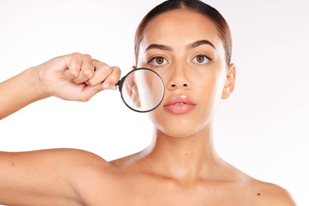 Woman, magnifying glass and skincare portrait for beauty wellness or healthy facial care in studio. Model face, Luxury spa cleaning and cosmetics makeup, check skin glow and natural dermatology. - 写真・画像