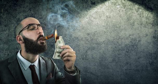 Money burning - businessman arrogant - Photo, Image