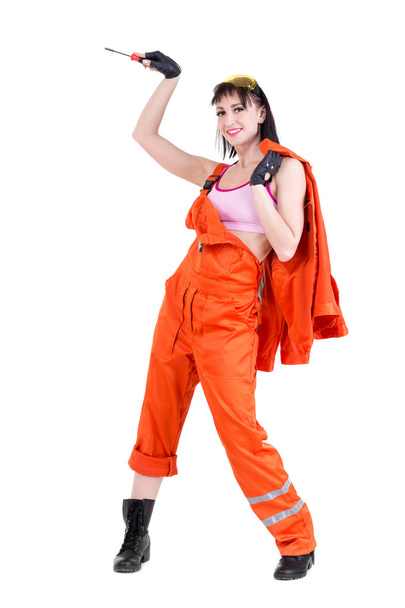 Young builder woman in uniform - Fotó, kép
