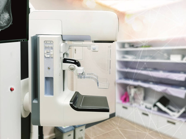 Mammography machine with monitor  for breast screening device on mammogram room background. - 写真・画像