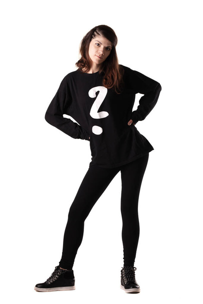 Full body portrait of a girl wearing black outfit with white question mark isolated on white background - Φωτογραφία, εικόνα