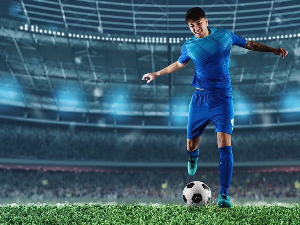 Giocatore pronto a calciare il pallone da calcio allo stadio durante la partita - Foto, immagini
