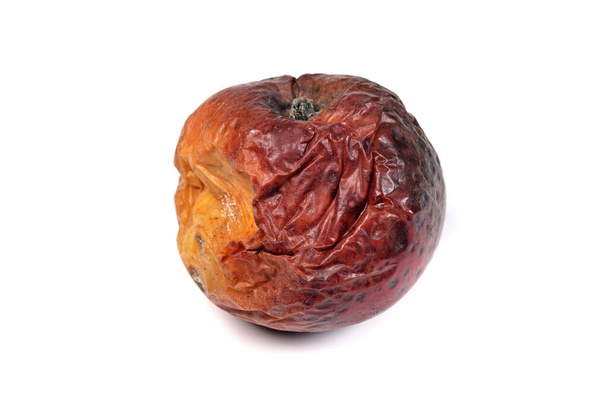 rothadt alma elszigetelt fehér háttér - Fotó, kép